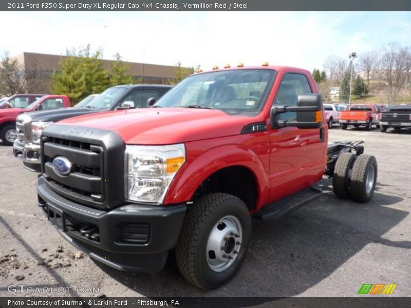 Front 3/4 View of 2011 F350 Super Duty XL Regular Cab 4x4 Chassis