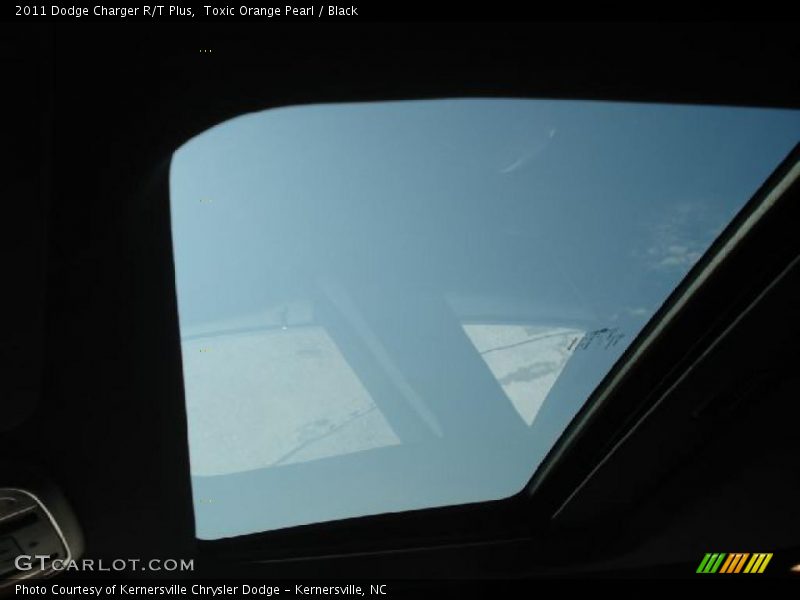 Toxic Orange Pearl / Black 2011 Dodge Charger R/T Plus