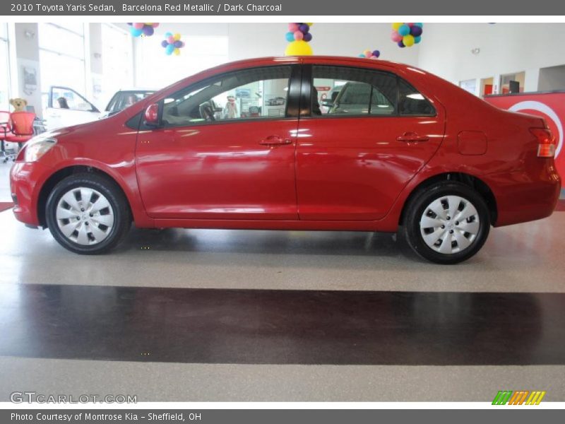 Barcelona Red Metallic / Dark Charcoal 2010 Toyota Yaris Sedan