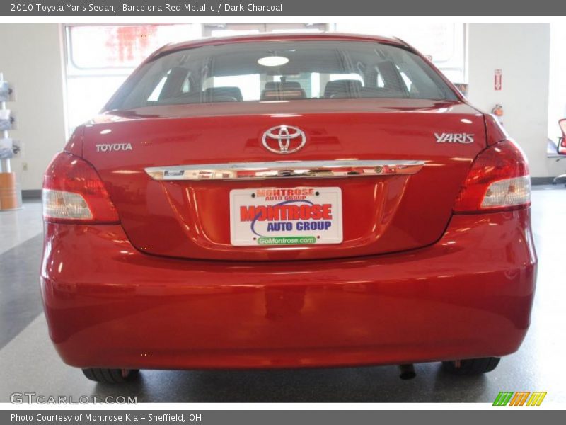 Barcelona Red Metallic / Dark Charcoal 2010 Toyota Yaris Sedan