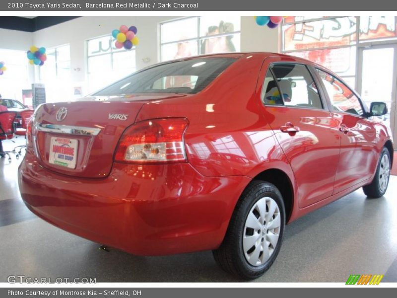 Barcelona Red Metallic / Dark Charcoal 2010 Toyota Yaris Sedan