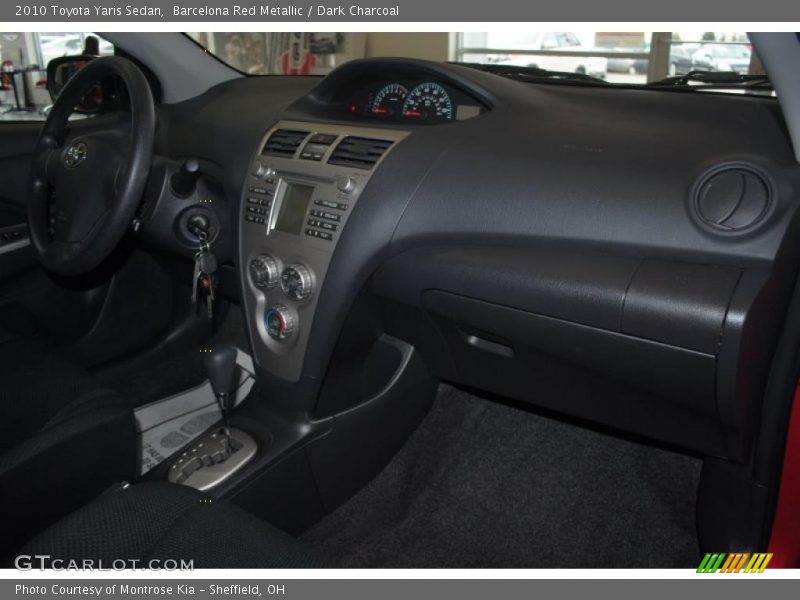 Barcelona Red Metallic / Dark Charcoal 2010 Toyota Yaris Sedan