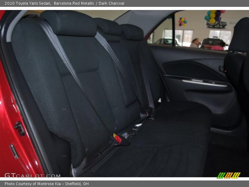Barcelona Red Metallic / Dark Charcoal 2010 Toyota Yaris Sedan