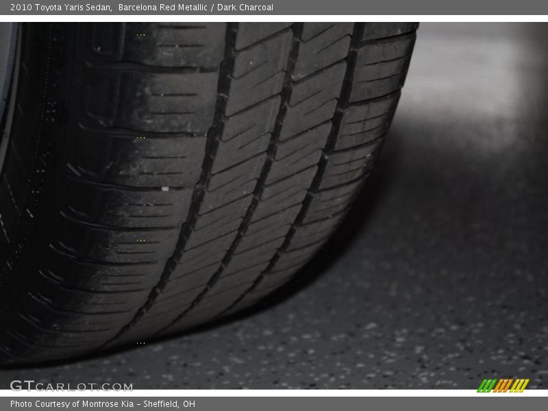 Barcelona Red Metallic / Dark Charcoal 2010 Toyota Yaris Sedan
