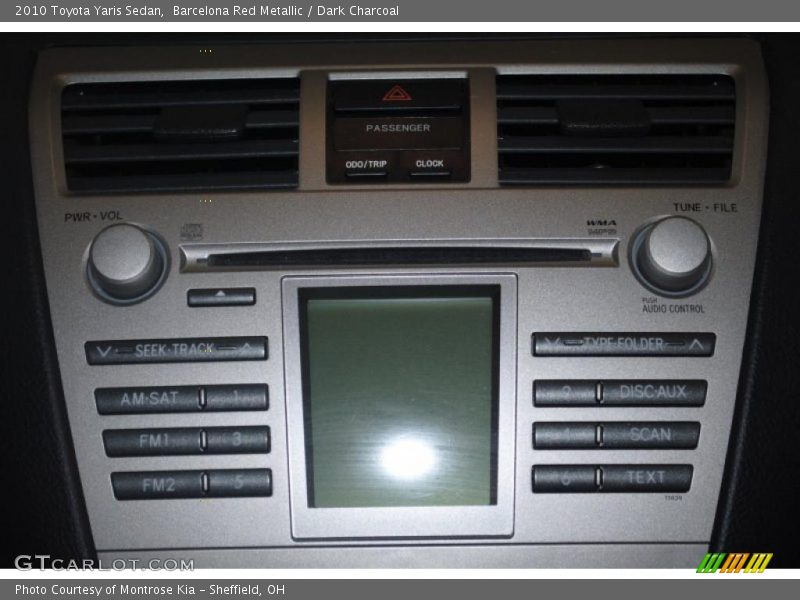 Barcelona Red Metallic / Dark Charcoal 2010 Toyota Yaris Sedan