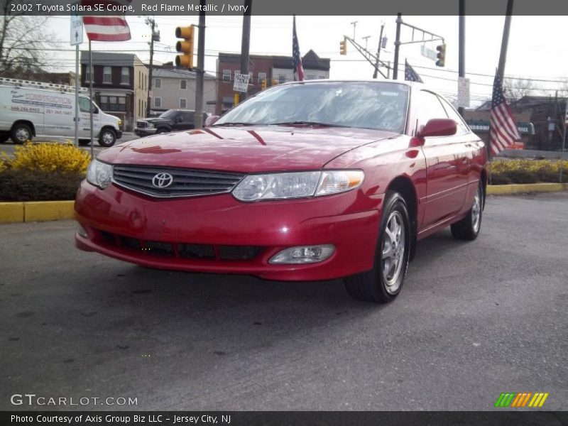 Red Flame Metallic / Ivory 2002 Toyota Solara SE Coupe