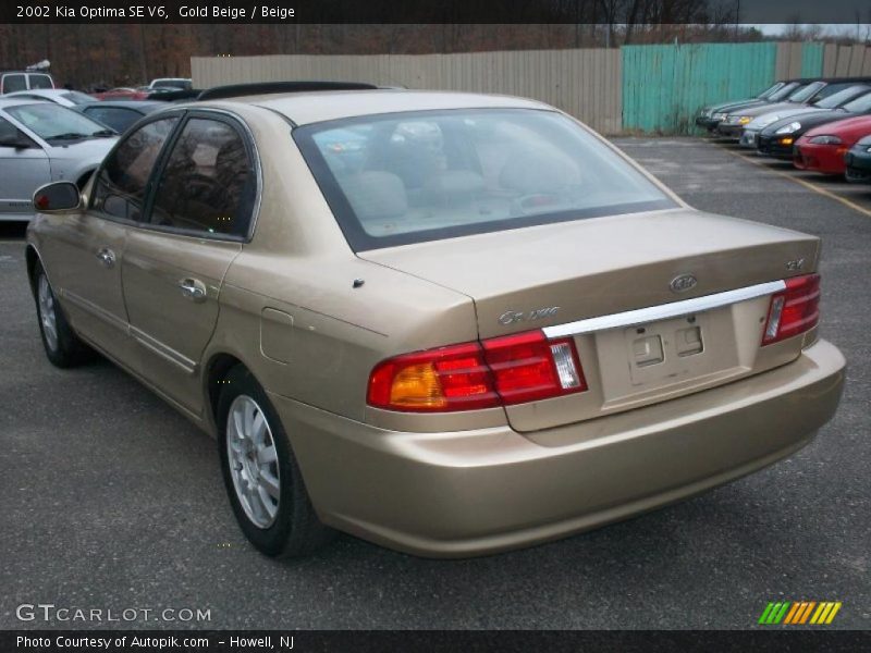 Gold Beige / Beige 2002 Kia Optima SE V6
