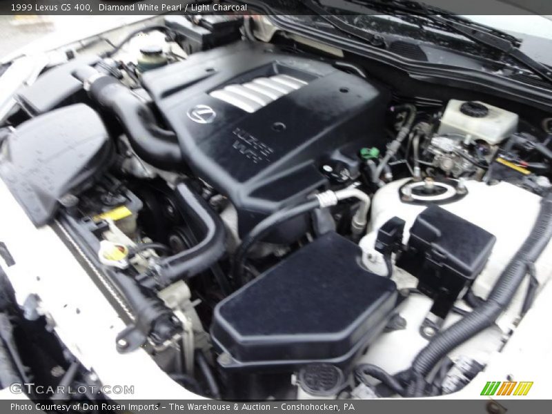 Diamond White Pearl / Light Charcoal 1999 Lexus GS 400
