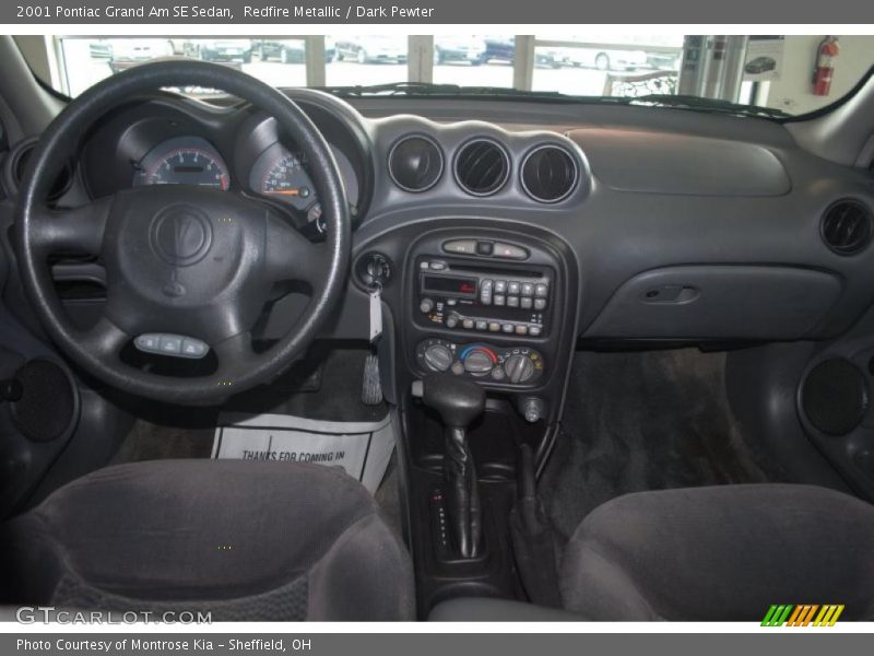 Redfire Metallic / Dark Pewter 2001 Pontiac Grand Am SE Sedan