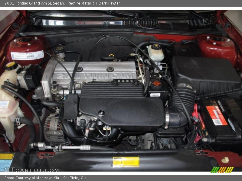 Redfire Metallic / Dark Pewter 2001 Pontiac Grand Am SE Sedan
