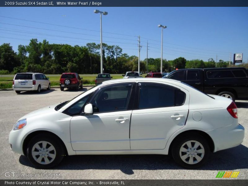  2009 SX4 Sedan LE White Water Pearl