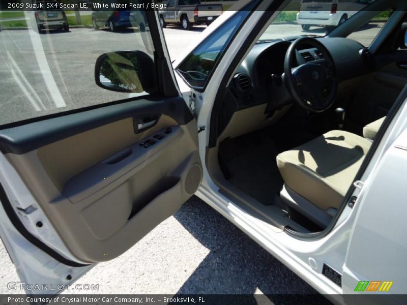 White Water Pearl / Beige 2009 Suzuki SX4 Sedan LE