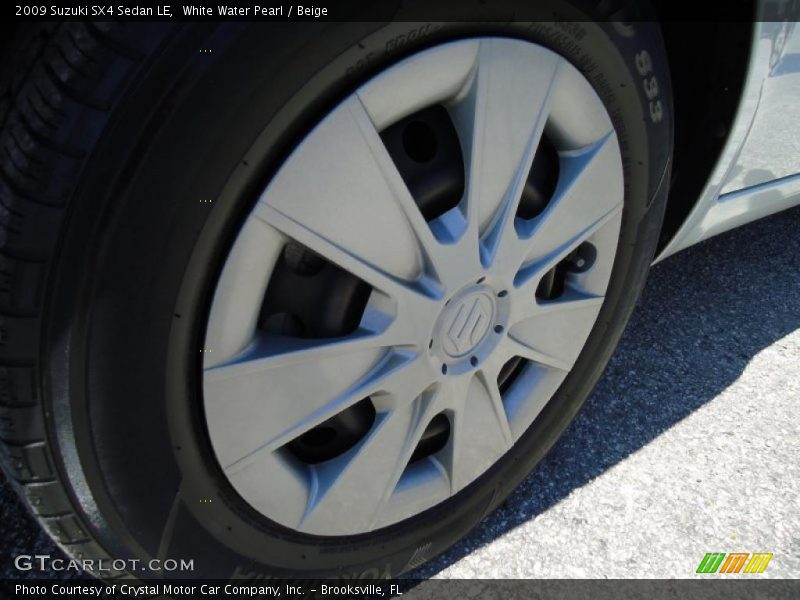 White Water Pearl / Beige 2009 Suzuki SX4 Sedan LE