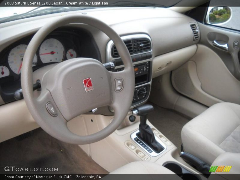 Cream White / Light Tan 2003 Saturn L Series L200 Sedan