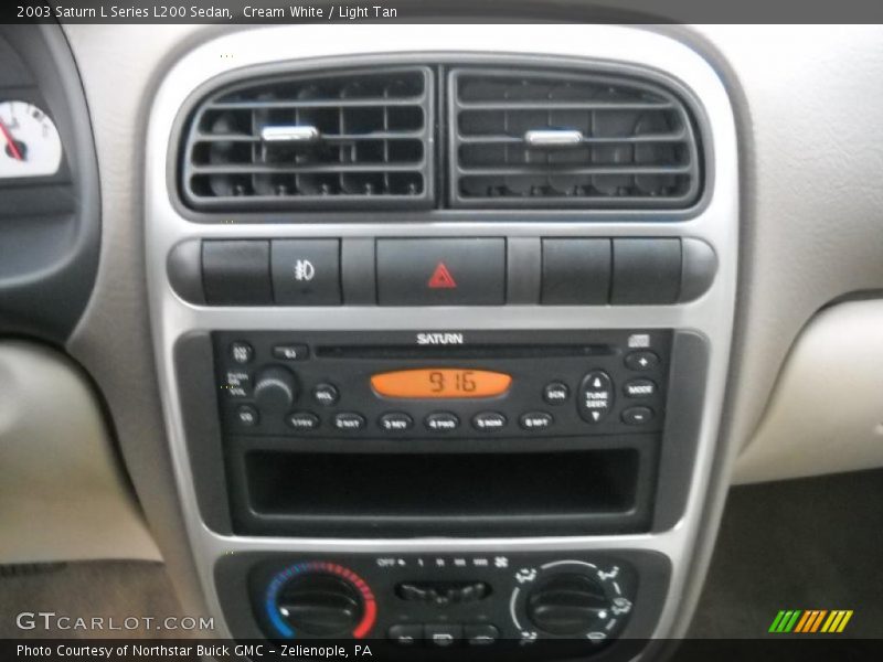 Cream White / Light Tan 2003 Saturn L Series L200 Sedan