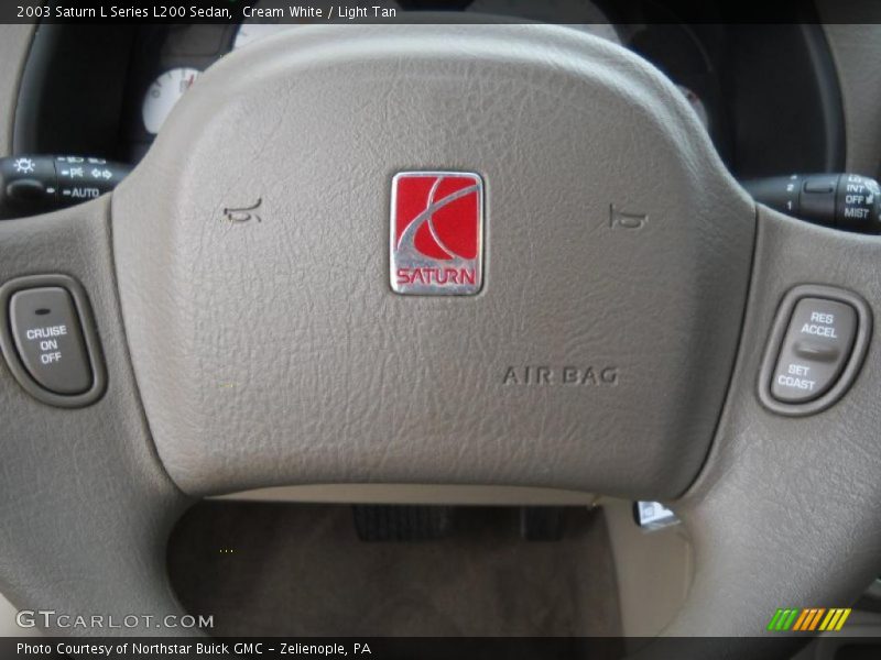 Cream White / Light Tan 2003 Saturn L Series L200 Sedan