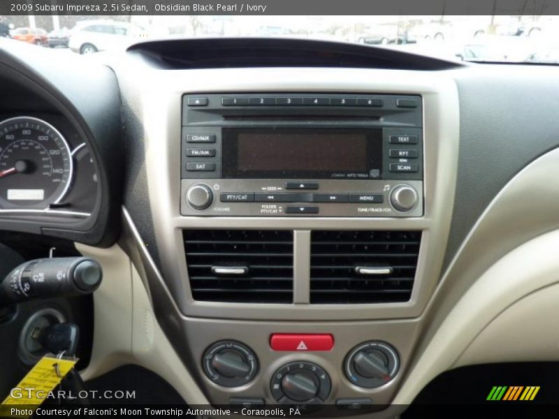 Obsidian Black Pearl / Ivory 2009 Subaru Impreza 2.5i Sedan