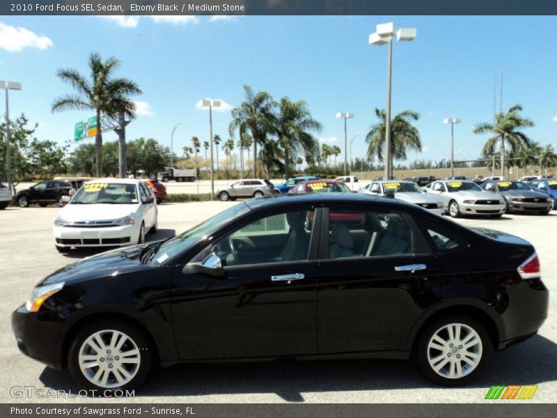 Ebony Black / Medium Stone 2010 Ford Focus SEL Sedan