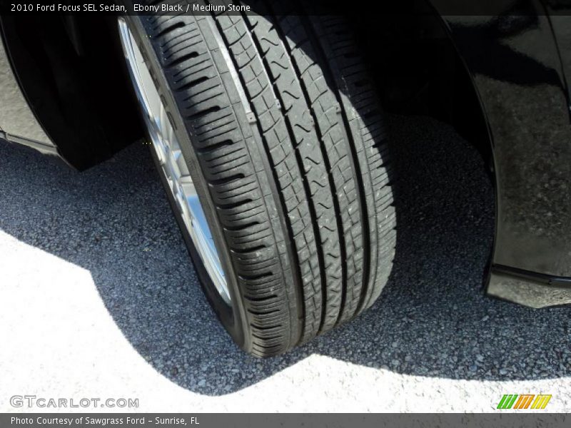 Ebony Black / Medium Stone 2010 Ford Focus SEL Sedan