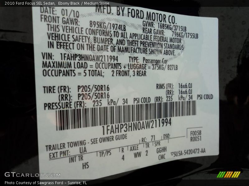 Ebony Black / Medium Stone 2010 Ford Focus SEL Sedan