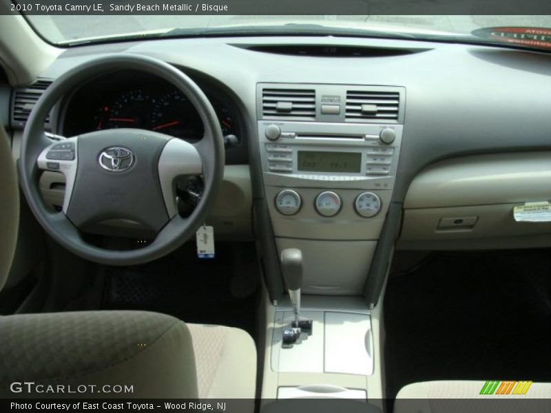 Sandy Beach Metallic / Bisque 2010 Toyota Camry LE