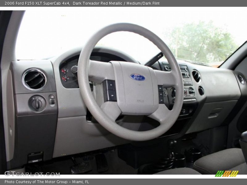 Dark Toreador Red Metallic / Medium/Dark Flint 2006 Ford F150 XLT SuperCab 4x4