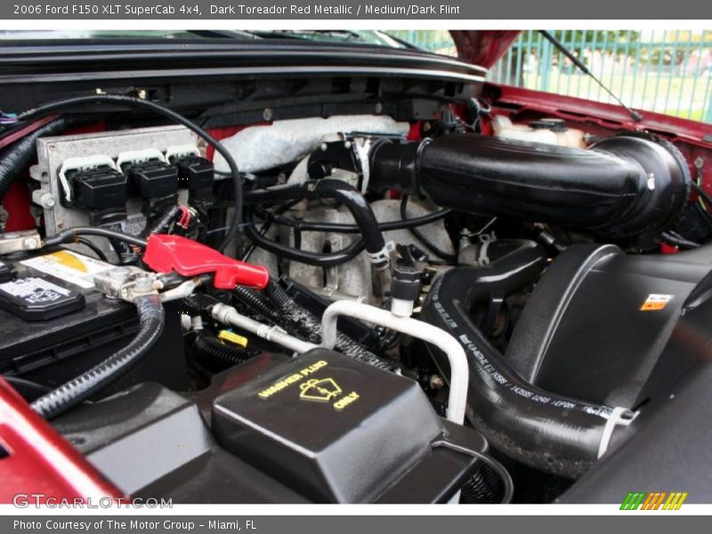 Dark Toreador Red Metallic / Medium/Dark Flint 2006 Ford F150 XLT SuperCab 4x4
