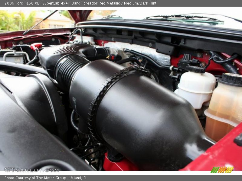 Dark Toreador Red Metallic / Medium/Dark Flint 2006 Ford F150 XLT SuperCab 4x4