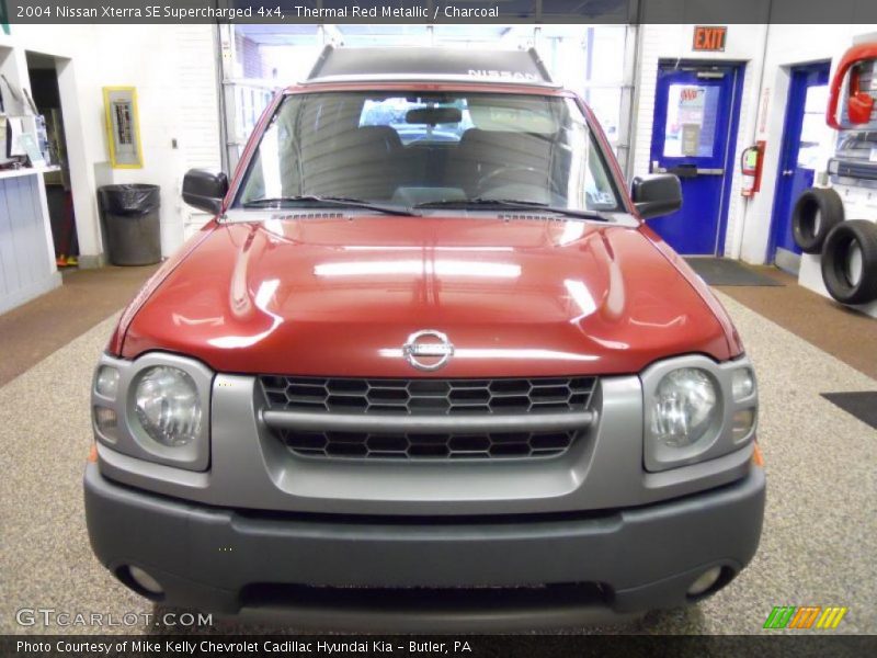 Thermal Red Metallic / Charcoal 2004 Nissan Xterra SE Supercharged 4x4