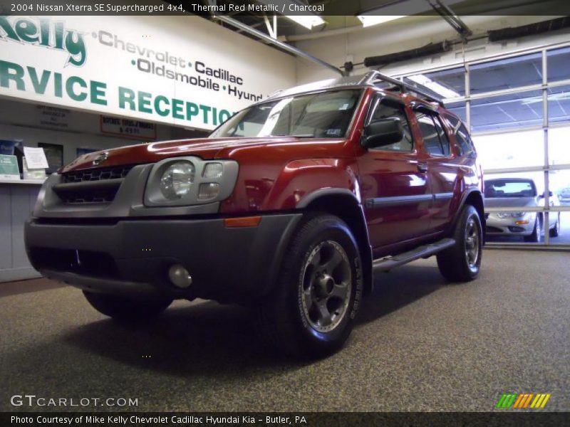 Thermal Red Metallic / Charcoal 2004 Nissan Xterra SE Supercharged 4x4