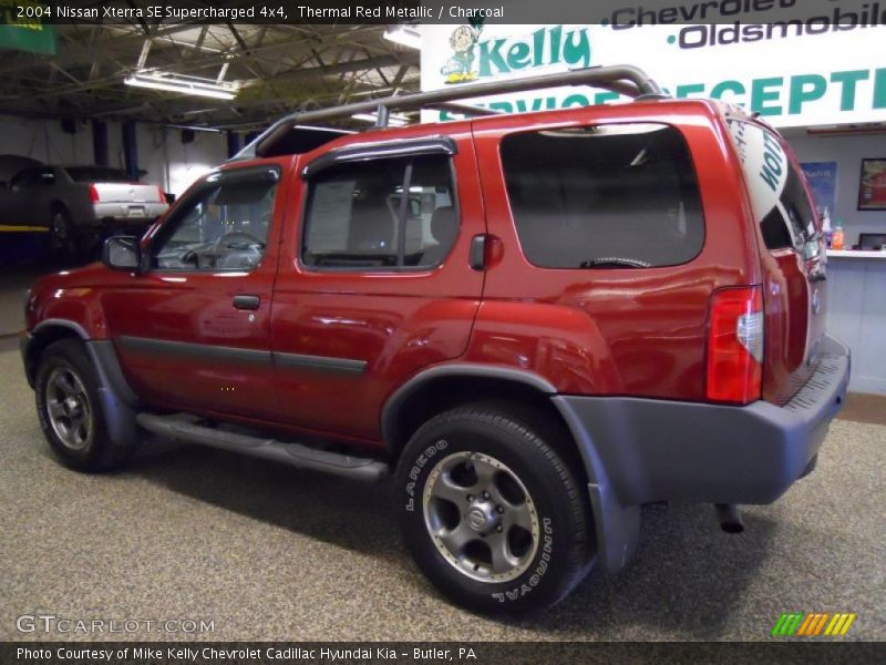 Thermal Red Metallic / Charcoal 2004 Nissan Xterra SE Supercharged 4x4