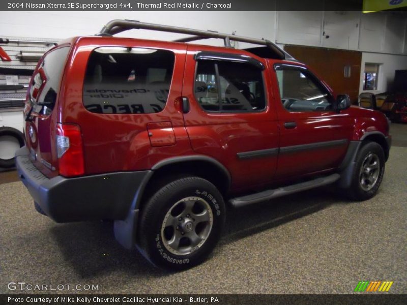 Thermal Red Metallic / Charcoal 2004 Nissan Xterra SE Supercharged 4x4