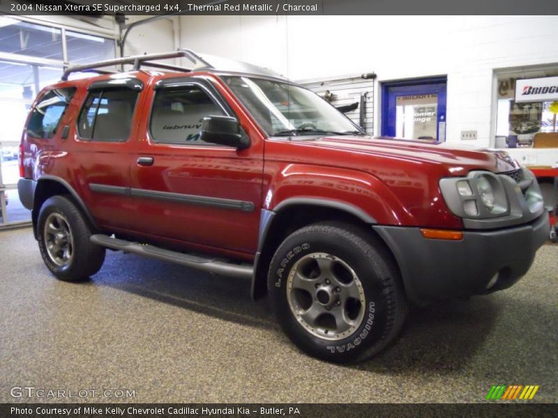 Thermal Red Metallic / Charcoal 2004 Nissan Xterra SE Supercharged 4x4