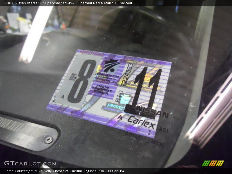Thermal Red Metallic / Charcoal 2004 Nissan Xterra SE Supercharged 4x4