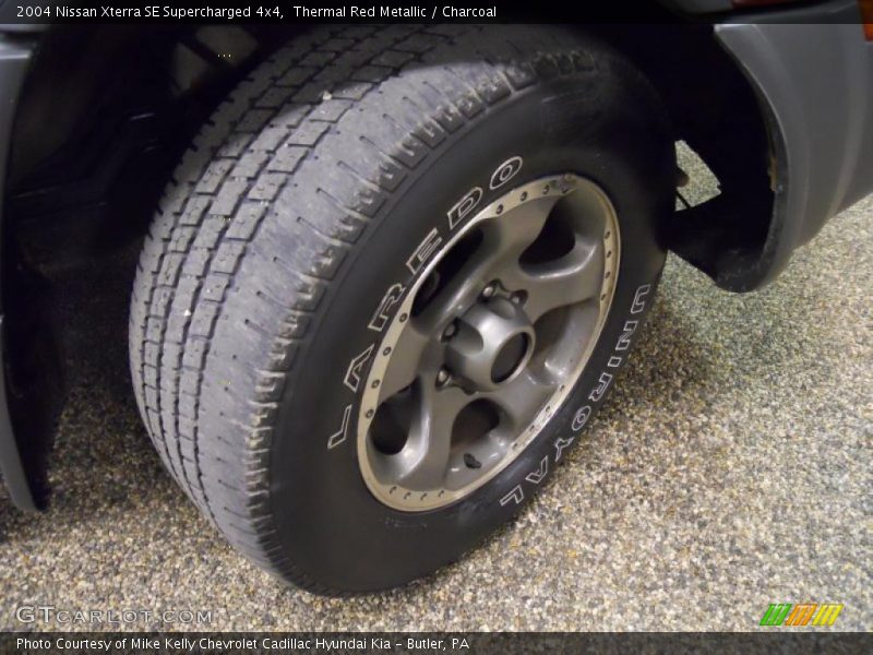Thermal Red Metallic / Charcoal 2004 Nissan Xterra SE Supercharged 4x4
