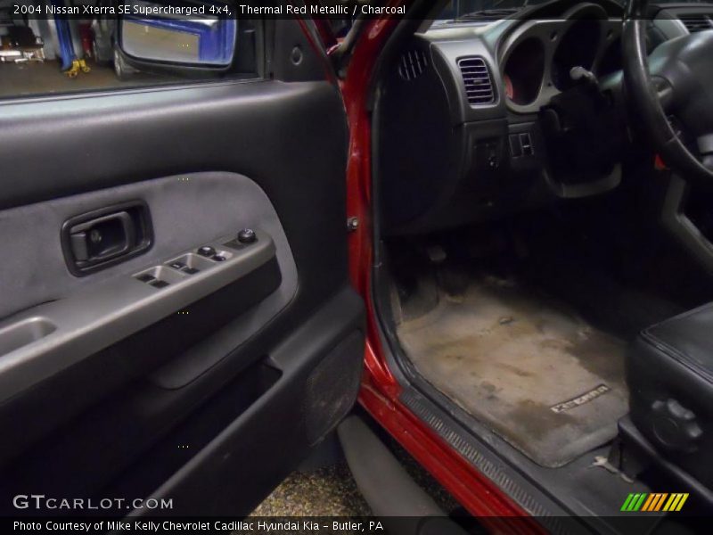 Thermal Red Metallic / Charcoal 2004 Nissan Xterra SE Supercharged 4x4