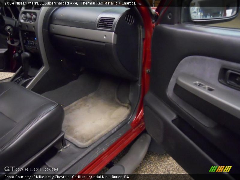 Thermal Red Metallic / Charcoal 2004 Nissan Xterra SE Supercharged 4x4