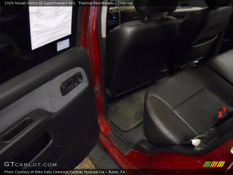 Thermal Red Metallic / Charcoal 2004 Nissan Xterra SE Supercharged 4x4