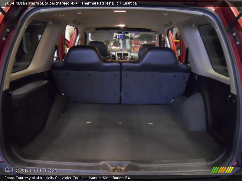 Thermal Red Metallic / Charcoal 2004 Nissan Xterra SE Supercharged 4x4