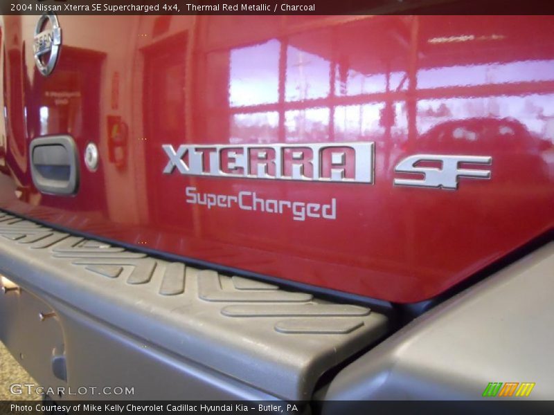  2004 Xterra SE Supercharged 4x4 Logo