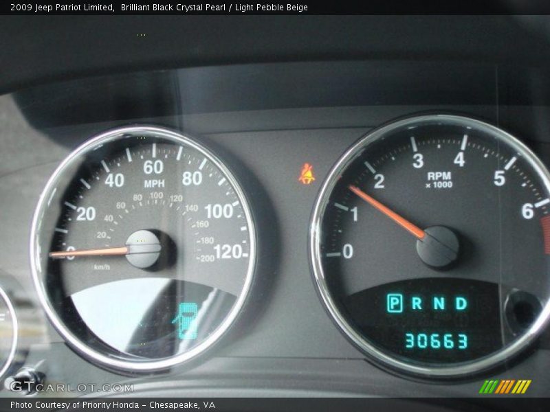 Brilliant Black Crystal Pearl / Light Pebble Beige 2009 Jeep Patriot Limited