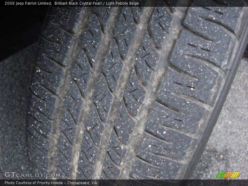 Brilliant Black Crystal Pearl / Light Pebble Beige 2009 Jeep Patriot Limited