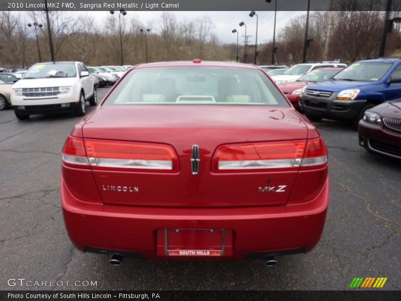 Sangria Red Metallic / Light Camel 2010 Lincoln MKZ FWD