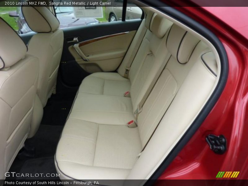 Sangria Red Metallic / Light Camel 2010 Lincoln MKZ FWD