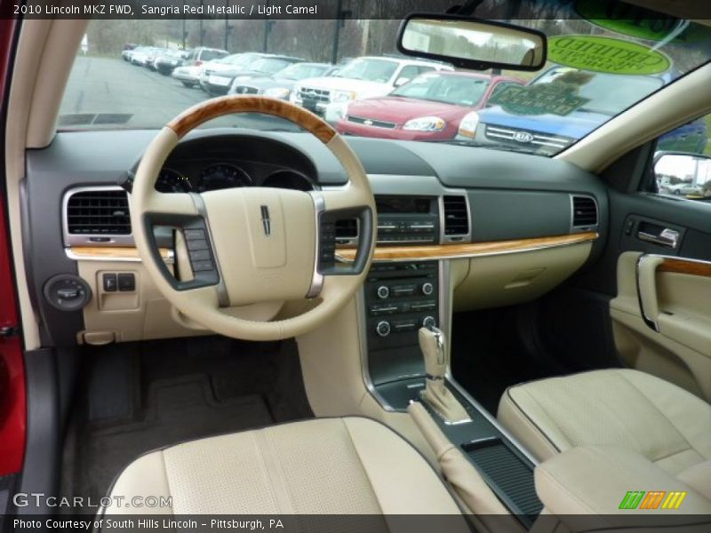 Sangria Red Metallic / Light Camel 2010 Lincoln MKZ FWD