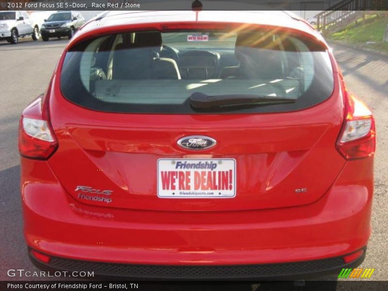 Race Red / Stone 2012 Ford Focus SE 5-Door