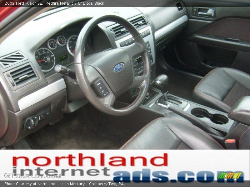 Redfire Metallic / Charcoal Black 2009 Ford Fusion SE