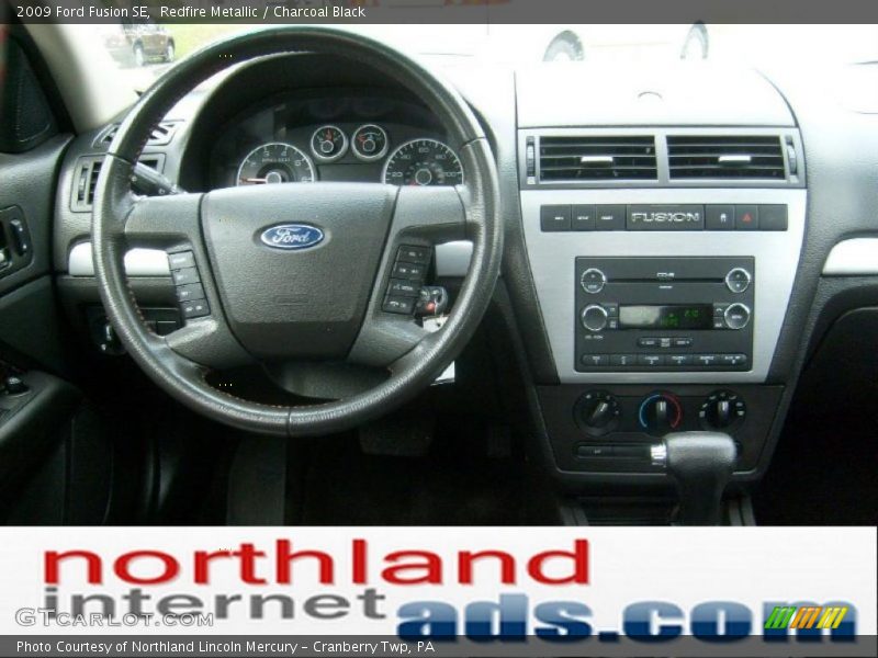 Redfire Metallic / Charcoal Black 2009 Ford Fusion SE