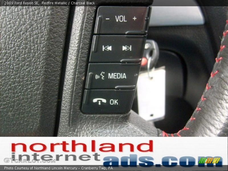 Redfire Metallic / Charcoal Black 2009 Ford Fusion SE
