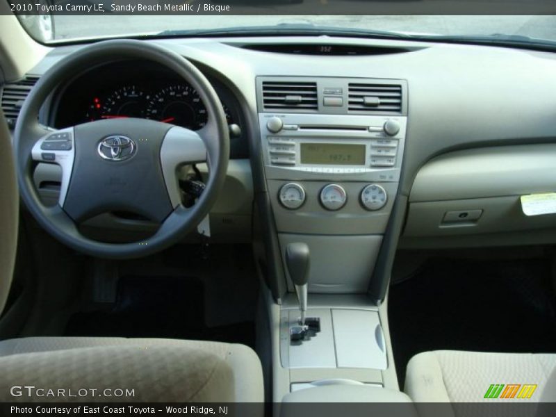 Sandy Beach Metallic / Bisque 2010 Toyota Camry LE